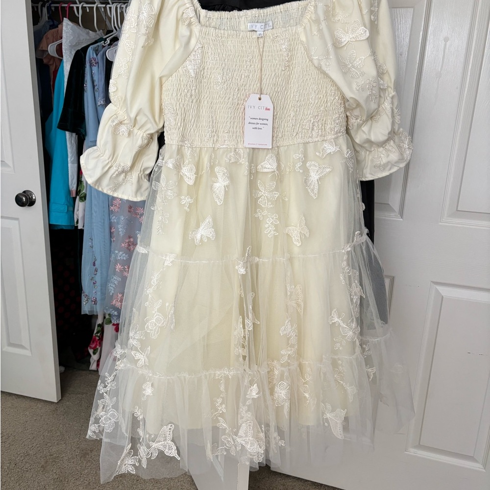 Elegant Cream Dress with Butterfly Embroidery